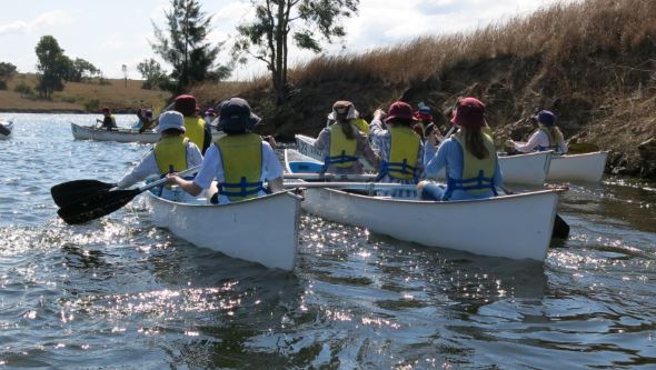 Students rowing